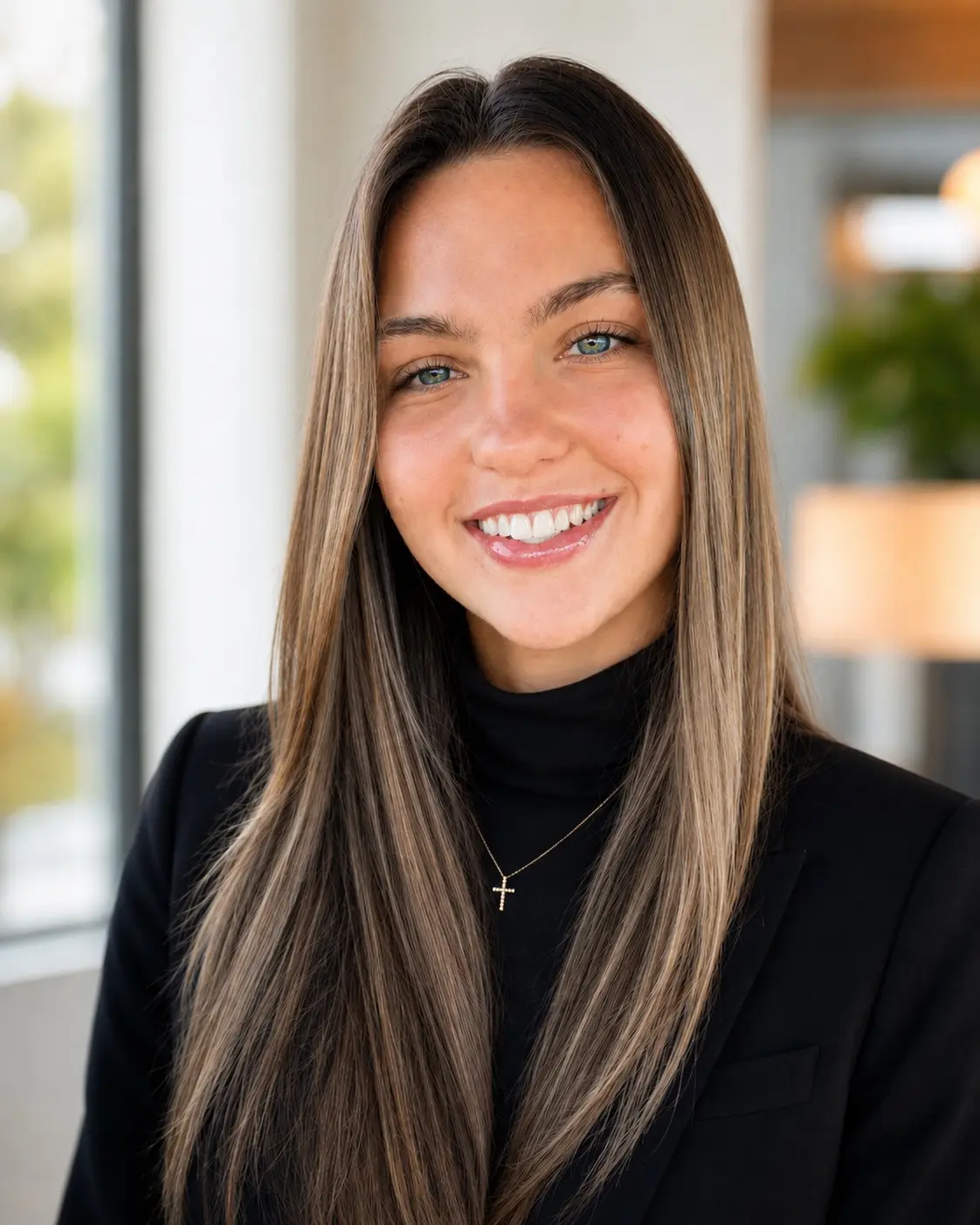 Professional black blazer headshot of Abigail Turbeville